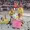 The team Hog Hooligans attempt to get their pig into the barrel during the pig wrestling competition Thursday evening at the Big Horn County Fair in Basin. From left, Ellie Thiel, Dalton Bankert, Harmony Hopkin, and Trinity Link. Lisa Kunkel