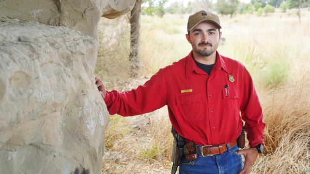 Senior Game Warden Daniel Tisi stands near the rimrocks on the banks of the Bighorn River in Greybull last week. Tisi is the new warden for the Greybull District of the Wyoming Game and Fish Department. Lisa Kunkel
