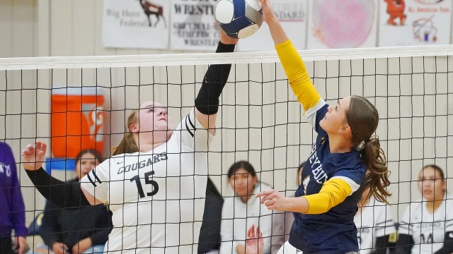 Greybull High School junior Caitlyn Hunt, right, jousts Wind River’s Devyn Fillin during their varsity matchup last Saturday afternoon in Buff Gym. Lisa Kunkel